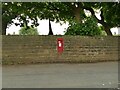 Postbox in the wall of St Luke