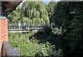 SP7387 : People on the footbridge by Bob Harvey