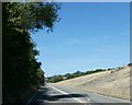 A361 passing Welcombe Copse in shallow cutting