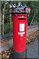 Yarn bombed  George V postbox on Orange Tree Hill