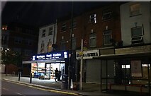 TQ3189 : Shops on Wightman Road, Harringay by David Howard