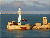 SY7076 : Portland Harbour, Breakwater Lighthouse by David Dixon