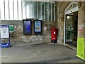 SE2421 : Display screens and postbox outside Dewsbury railway station by Stephen Craven