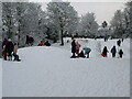 Quarry Hollow Play Area with children playing in the snow