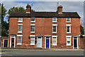 Terraced red brick houses on Smithfield Road