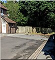 Wooden fence across the dead end of Queens Drive, Moreton, Dorset