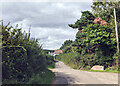 Sign for Llanveynoe Church and houses ahead