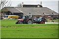 Tractor spraying crops