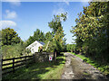 Minor road passing Red Barn