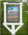 Sign for the Langley Tavern