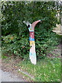 SE1437 : National Cycle Network milepost on the Airedale Way by Oliver Dixon