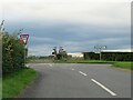SE7766 : Road junction in Burythorpe parish by Gordon Hatton
