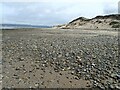SS4496 : Pebble beach near Whiteford Point by Eirian Evans