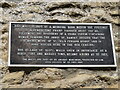 St Ives Priory wall plaque