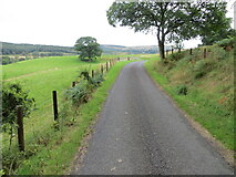 NN7619 : Farm road heading towards Dalrannoch by Peter Wood