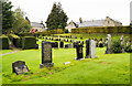 Gravestones in the graveyard of the Dyke Parish Church