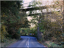 SK1072 : Railway Bridge over the A6, Wye Dale by David Dixon