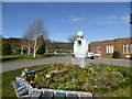 SD6427 : A sculpture and flower bed at Pleasington Crematorium by David Medcalf