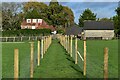 Path between new fences at Frogham