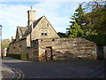 Building with colourful garden wall, Back Lane, Broadway