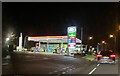 SJ8543 : Esso filling station by night by Jonathan Hutchins