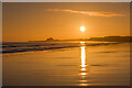 NU1438 : Sunrise at Ross Back Sands by Ian Capper