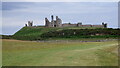 NU2521 : Dunstanburgh Castle by Sandy Gerrard