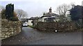 St Christoph Cottage on east side of minor road south of Warwick Bridge