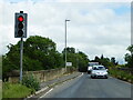 SE3679 : Traffic lights at Skipton Bridge on the River Swale by Rod Allday
