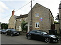 Houses and signpost, Morcott