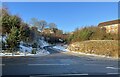 Access road to new housing estate off A527