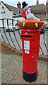 TM4462 : Snowman postbox topper, outside Leiston library by Christopher Hilton