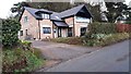 Broomhill, a house on NE side of road SE of Faugh