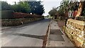 NY5057 : East-west road through Hayton passing Townfoot House on the left by Roger Templeman