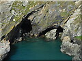 SX0589 : Caves, Tintagel coast by Bryn Holmes