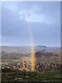 SE0998 : Unusually curved rainbow above bridleway by Trevor Littlewood