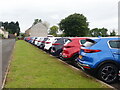 A neat row of cars at Gravells Kia Showroom