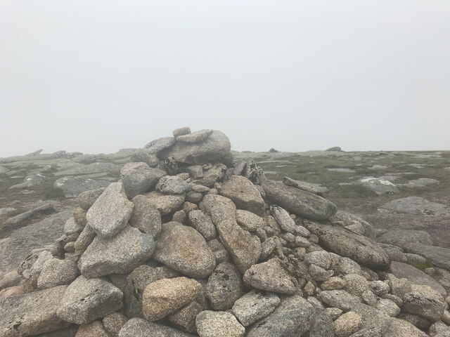 Summit Carn a' Choire Bhoidheach A Munro defined as a mountain in Scotland with a height over 3,000 feet (914.4 m), and which is on the Scottish Mountaineering Club (SMC) official list of Munros; there is no explicit topographical prominence requirement.
