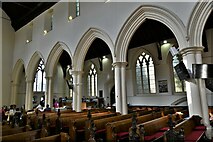 TM0458 : Stowmarket, St. Peter and St. Mary's Church: Nave and north aisle in which there is a refreshment area by Michael Garlick