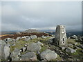 NS7224 : Prehistoric cairn and trig point on Cairn Table by Alan O'Dowd