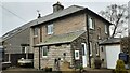 West Cottage on east side of road to Easby