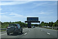 On the M4 heading south-west, overhead gantry with road signs ahead