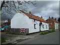 Goodmanham.  Brockenhirst.  Late  C17  stone  cottage