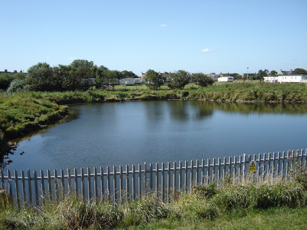 pond-and-caravan-site-from-queen-s-martin-dawes-geograph