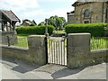 Gate to the war memorial at St John