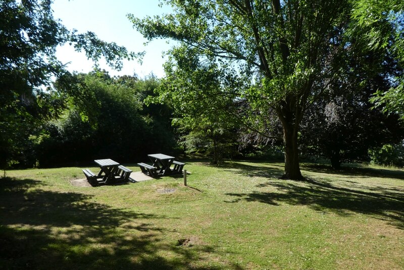 Picnic benches near the library © DS Pugh Geograph Britain and Ireland