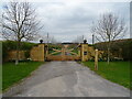 Gated road to Kingswood Farm