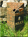 Old milepost on the A689 at Hare Law