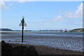 Llanreath Beacon at low tide