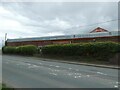 Brick wall of former paper mill, Oakenholt